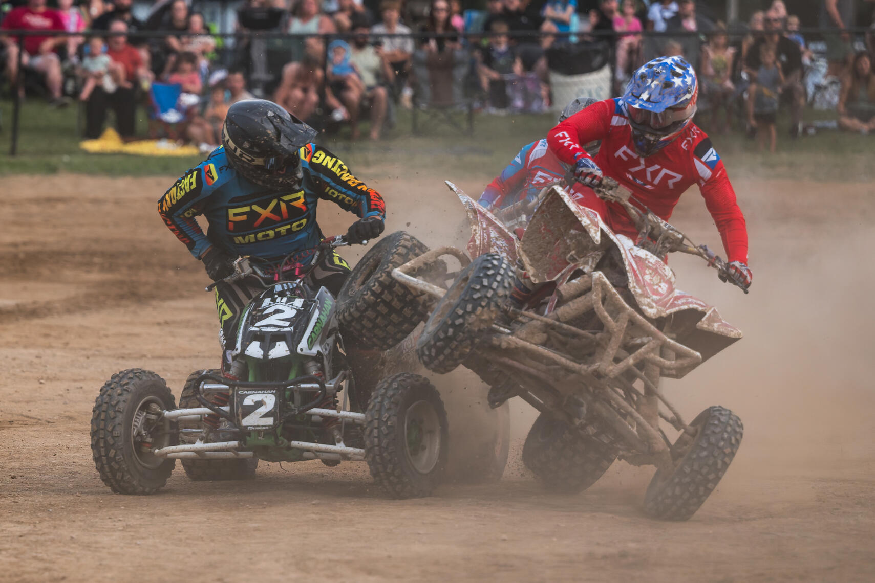 WESTMINSTER, MD - A Quad rider strikes another during a race at the Monster Truck Roundup on July 11, 2026, at the Carroll County AG Center.