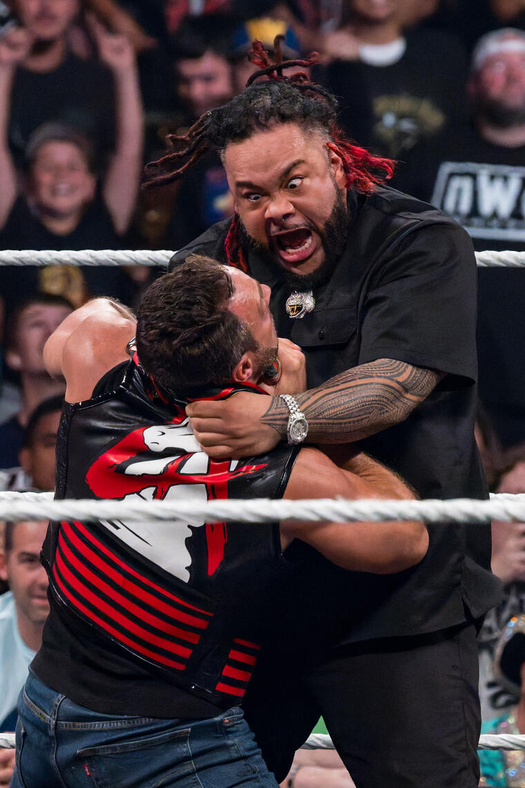 BALTIMORE, MD - Jacob Fatu attacks LA Knight during a WWE Monday Night Raw segment on June 15, 2026, at CFG Bank Arena.